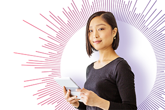 Businesswoman stands in front of purple circle starburst