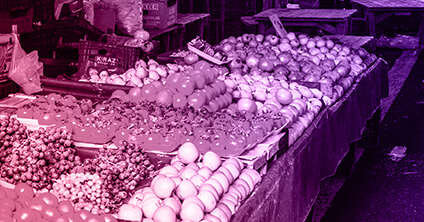 Close up of selection of fruit sold at market stalls