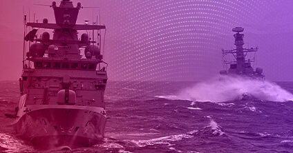 Naval boat on choppy seas filtered through pink and purple light